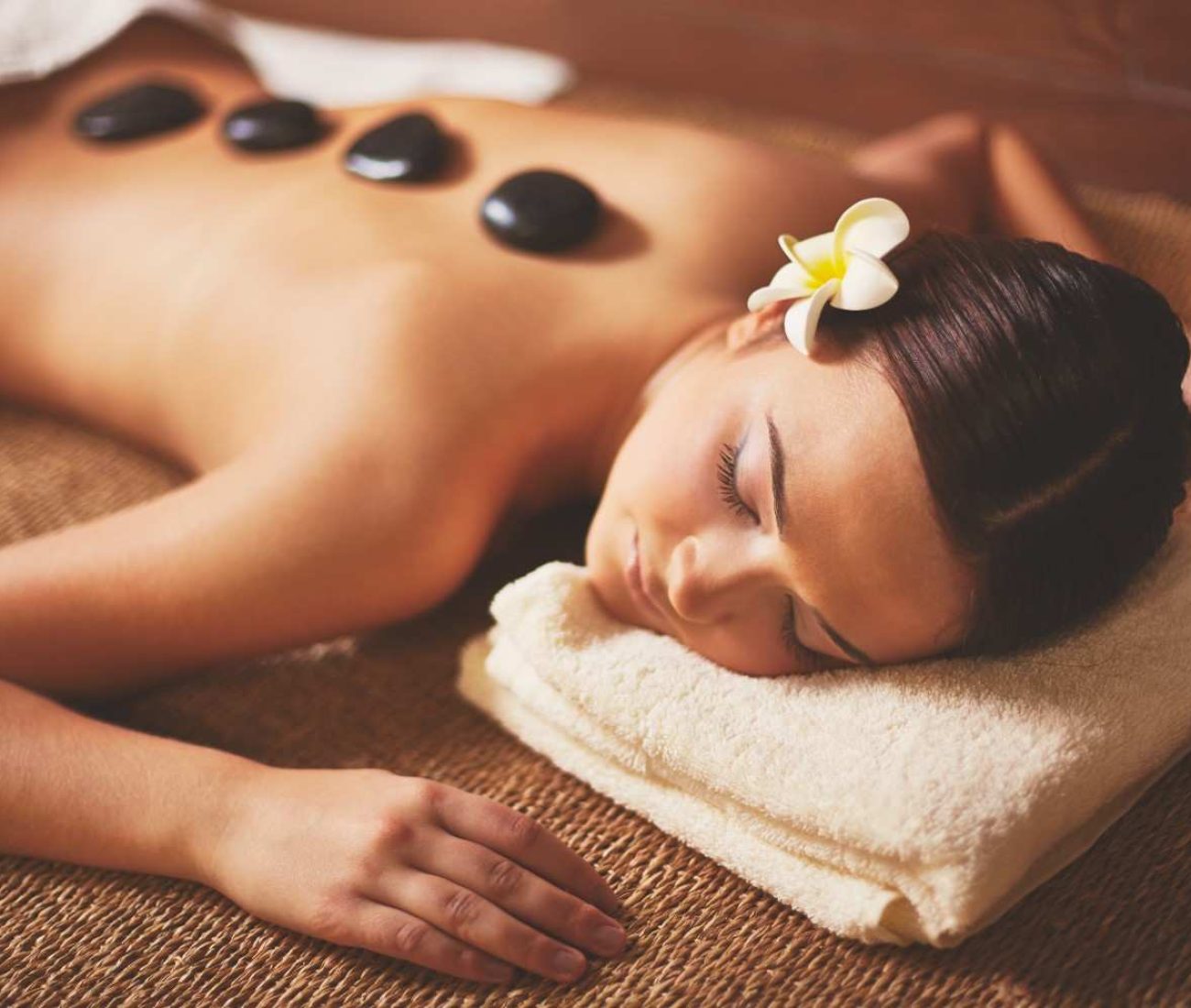 woman-enjoying-stone-massage (1)