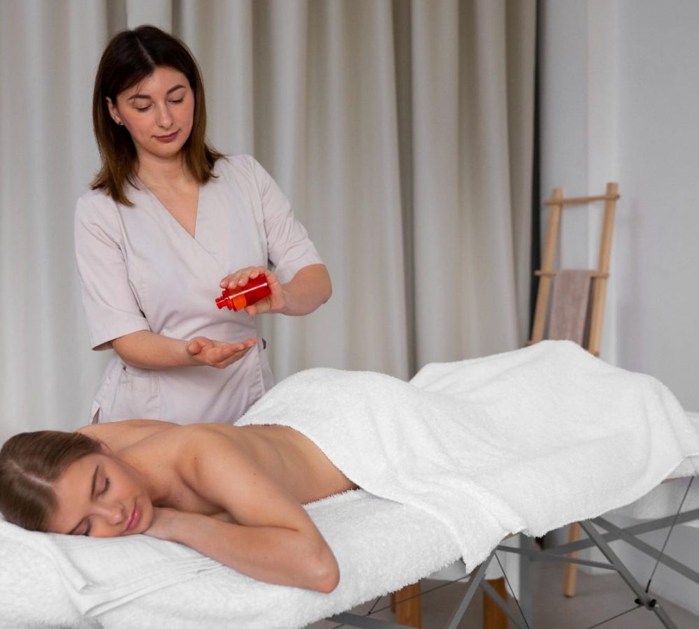 woman-getting-back-massage-from-masseur1