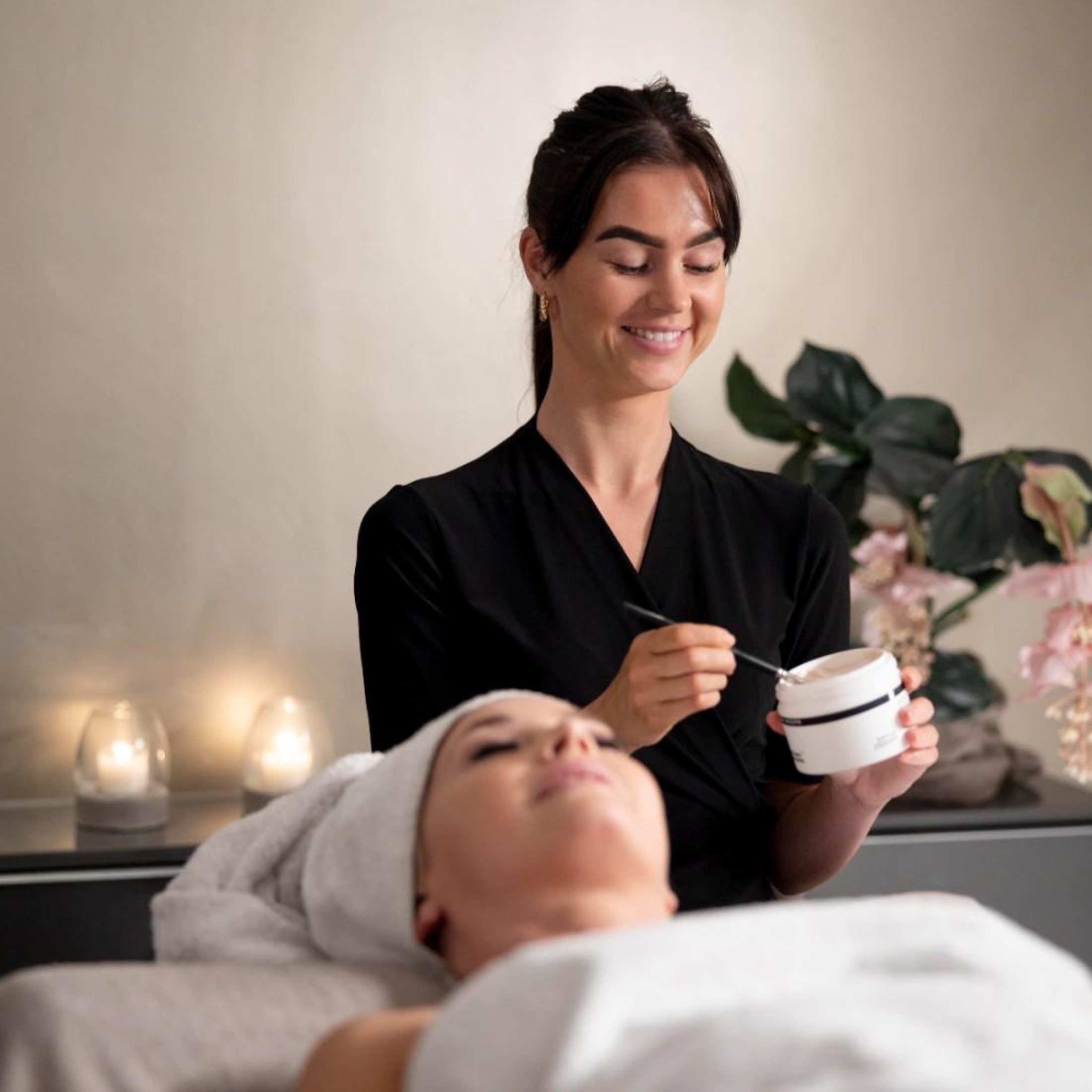 young-woman-using-face-treatment-her-client1